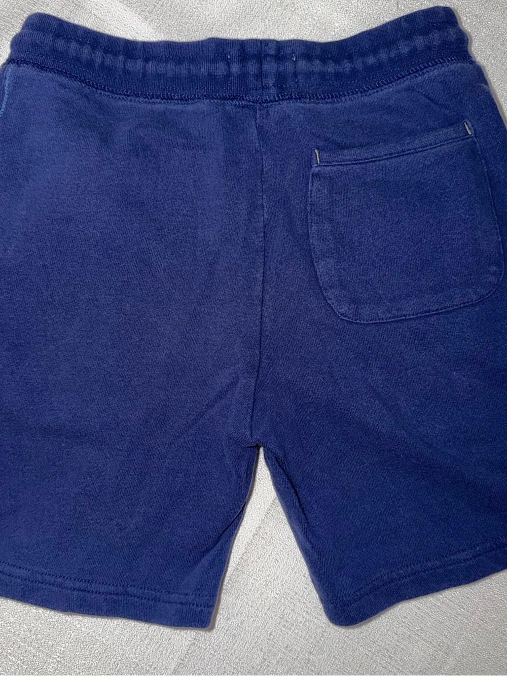 Two Mini Boden appliqué T-shirts, and two pair of shorts size 5/6